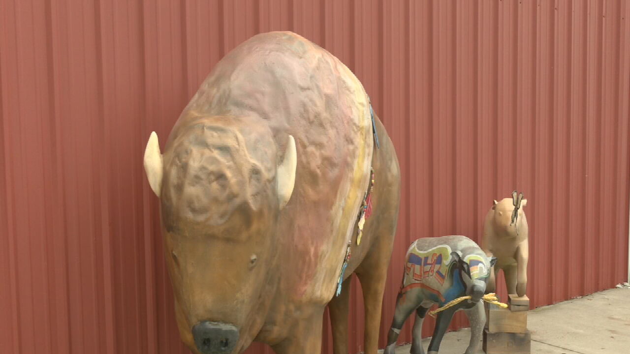 Buffalo sculptures unveiled at Louisville restaurant honor the area's past